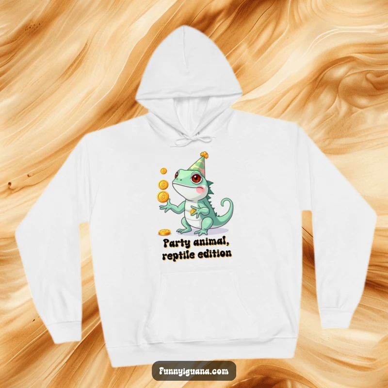 Funny Kawaii Iguana Hoodie: warm hoodie with a cute iguana wearing a party hat, juggling three shiny coins in a comical display.